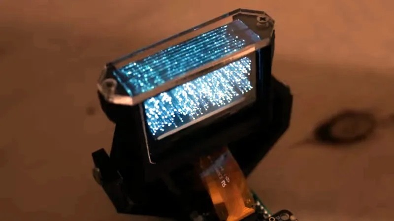 Tiny 3D display made from transparent oled screens.